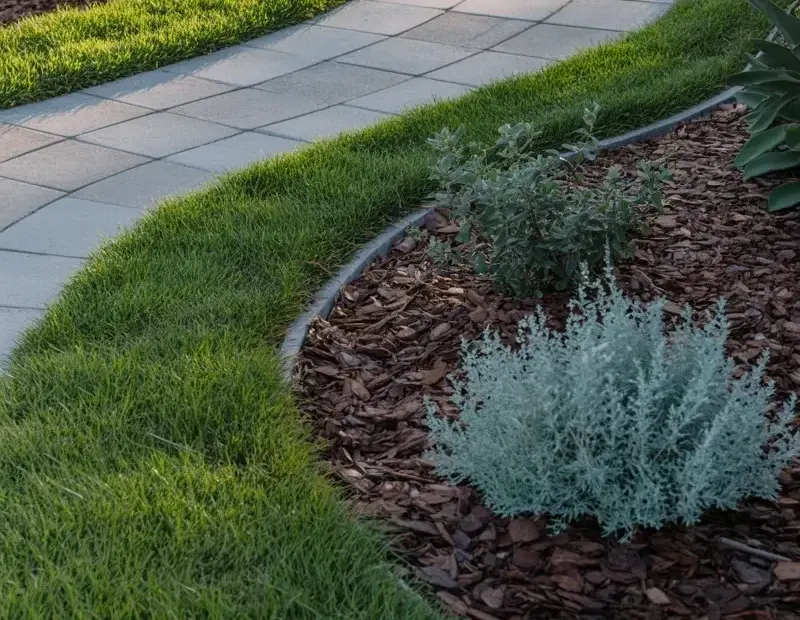 How to Build a Curved Garden Path with Concrete Pavers and Mulch Beds